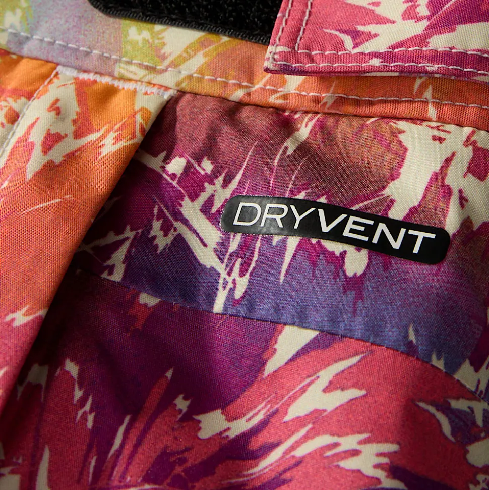 Shop The North Face Isolerede Freedom Bukser Til Piger Radiant Poppy Blowing Wind Print