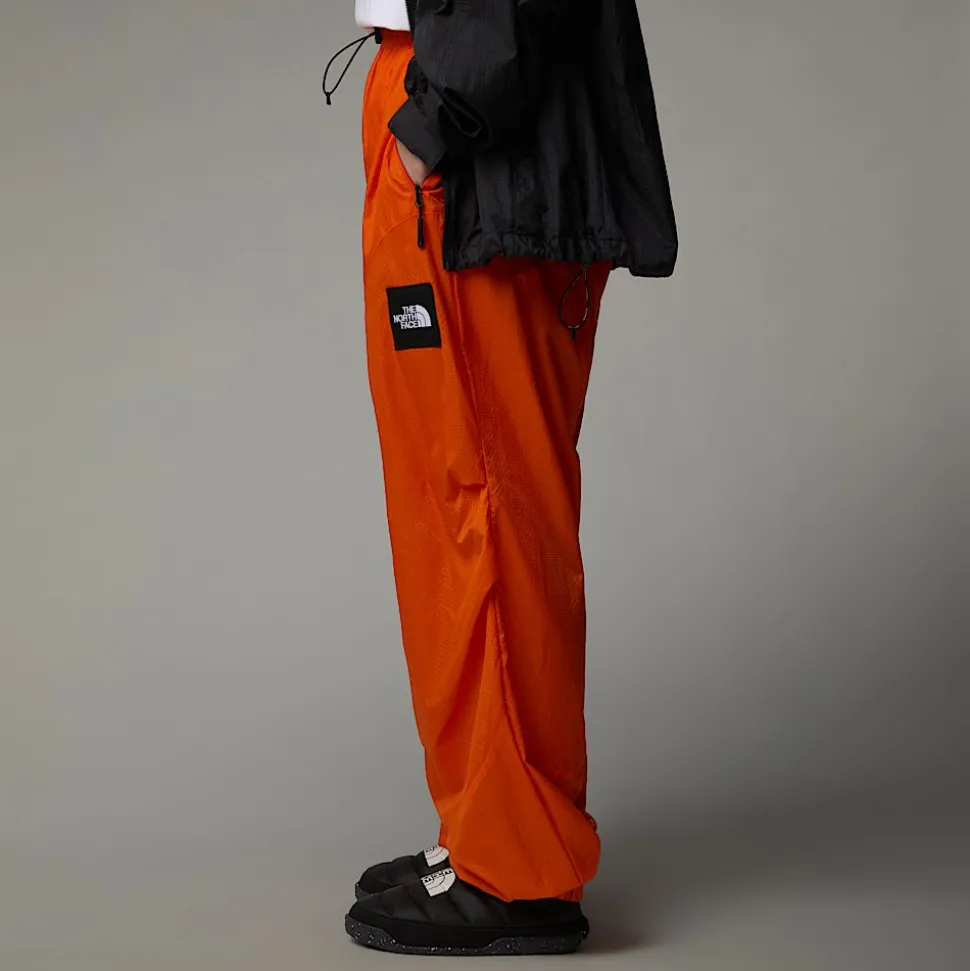 Clearance The North Face Unisex TNF X Yinka Ilori Wind Skalbukser Red Orange
