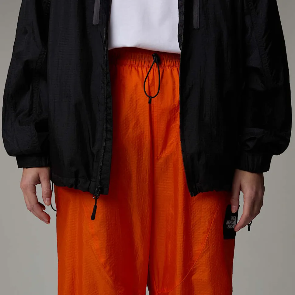 Clearance The North Face Unisex TNF X Yinka Ilori Wind Skalbukser Red Orange