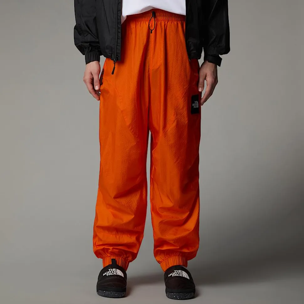 Clearance The North Face Unisex TNF X Yinka Ilori Wind Skalbukser Red Orange