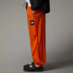 Clearance The North Face Unisex TNF X Yinka Ilori Wind Skalbukser Red Orange